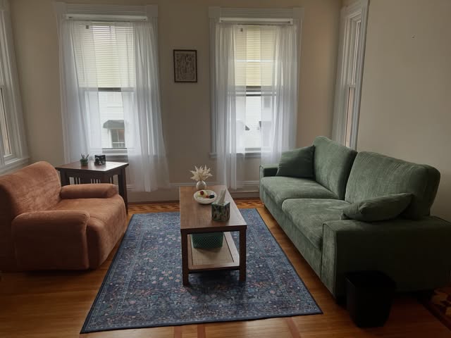 A warm, comfortable therapy office in Pittsfield, MA with soft seating and natural light